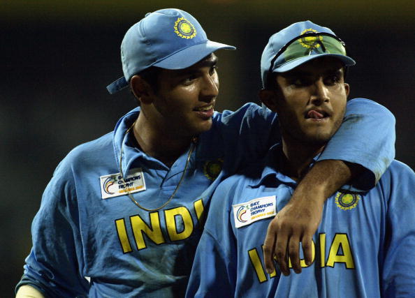 COLOMBO - SEPTEMBER 25: Yuvraj Singh and Sourav Ganguly of India celebrate victory after the ICC Champions Trophy semi-final match between India and South Africa held on September 25, 2002 at the R. Premadasa Stadium, in Colombo, Sri Lanka. (Photo by Clive Mason/Getty Images)