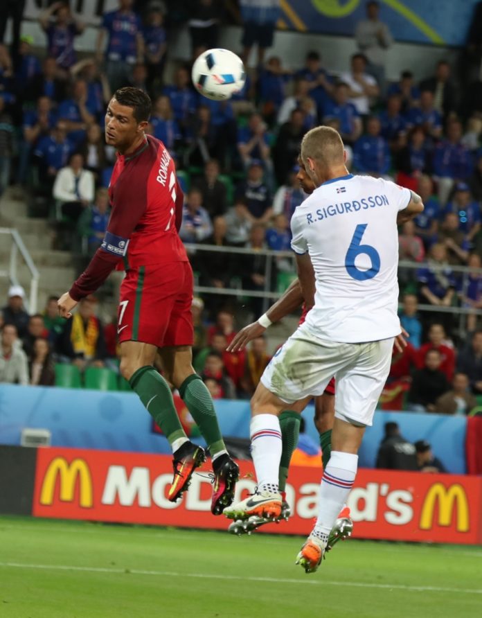 SAINT-ETIENNE, June 15, 2016 (Xinhua) -- Cristiano Ronaldo of Portugal competes during the Euro 2016 Group F soccer match between Portugal and Iceland in Saint-Etienne, France, June 14, 2016. (Xinhua/Bai Xuefei/IANS)