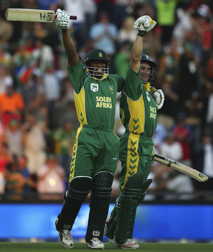 JOHANNESBURG, SOUTH AFRICA - MARCH 12:  Makhaya Ntini (L) and Mark Boucher of South Africa celebrate the winning runs during the fifth One Day International between South Africa and Australia played at Wanderers Stadium on March 12, 2006 in Johannesburg, South Africa.  (Photo by Hamish Blair/Getty Images)