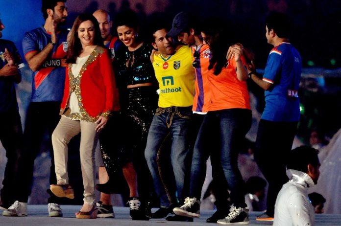 Founding chairperson of Indian Super League Nita Ambani with actors Priyanka Chopra, Hrithik Roshan, cricket legend Sachin Tendulkar and others during inauguration of Indian Super League at Vivekananda Yuba Bharati Krirangan in Kolkata, on Oct.12, 2014. (Photo: Kuntal Chakrabarty/IANS)
