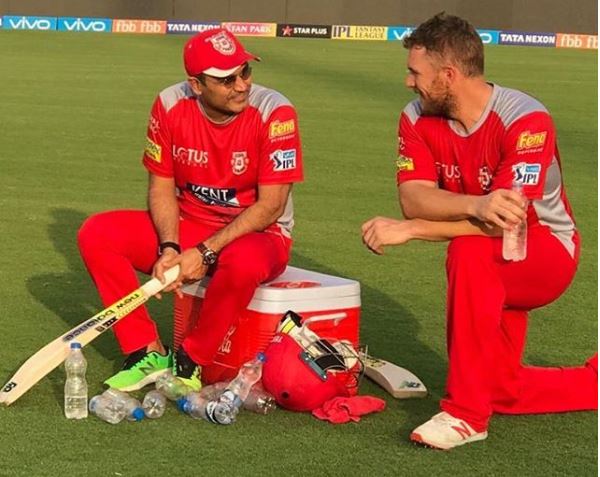 Aron finch shares pic with legend sehwag before match