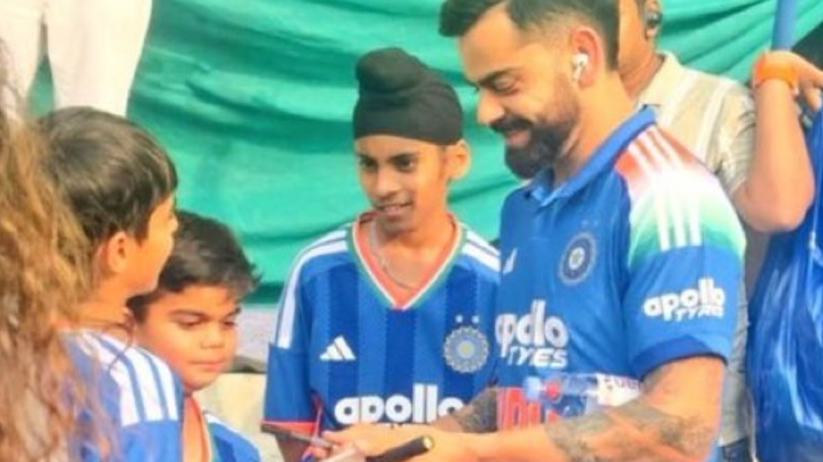 Virat Kohli was seen giving an autograph to his exact miniature lookalike.