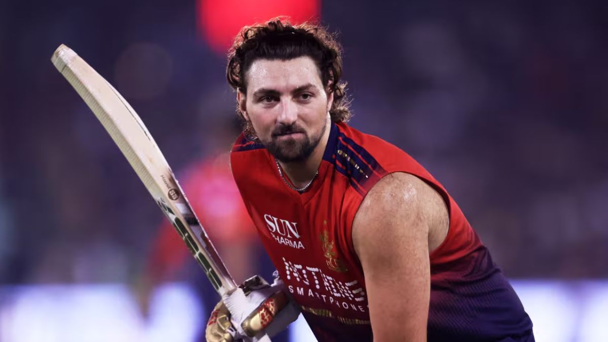 IPL 2027 के पहले मैच से बैन हुआ RCB का सबसे बड़ा मैच विनर, BCCI ने किया सस्पेंड, वजह बेहद चौंकाने वाली 2 The ban on Tim David has been imposed for throwing an ice pack at umpire Nitin Menon during the IPL 2026 final match.